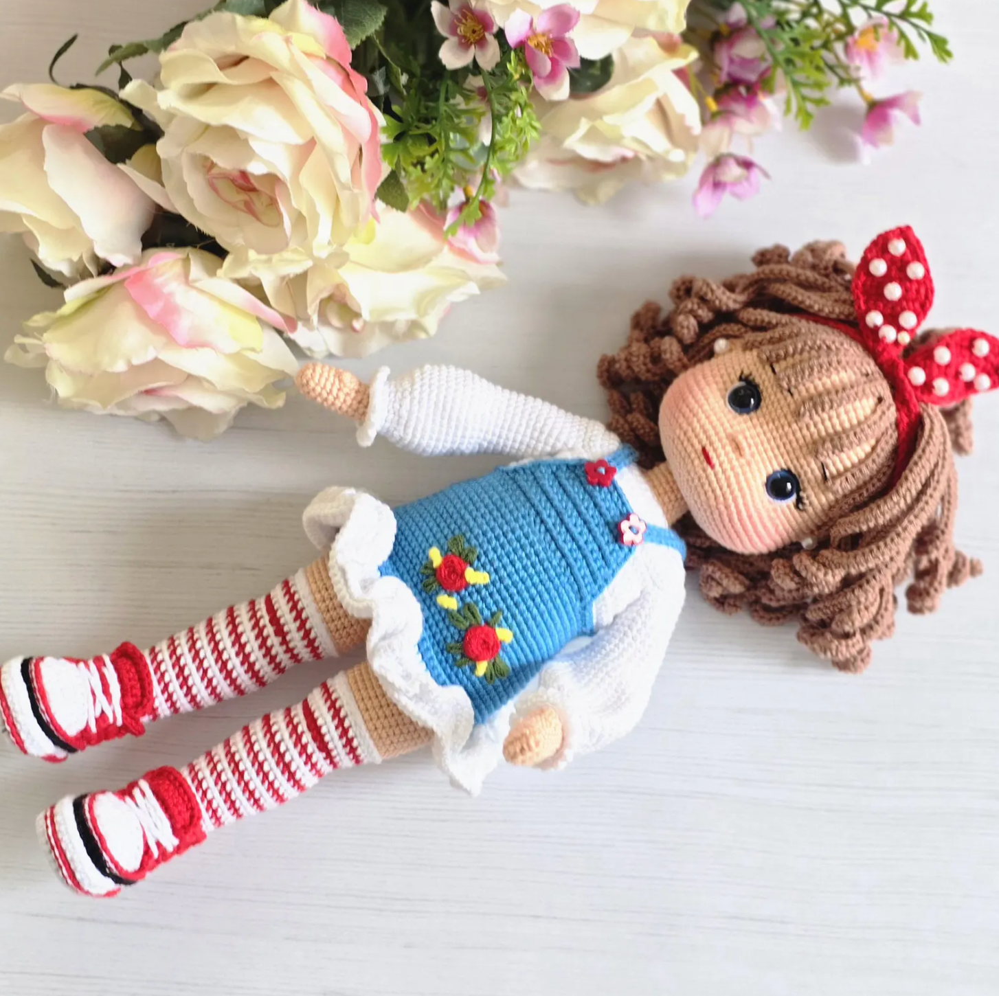 Amigurumi fashionista doll crochet pattern – curly hair floral dress and striped socks