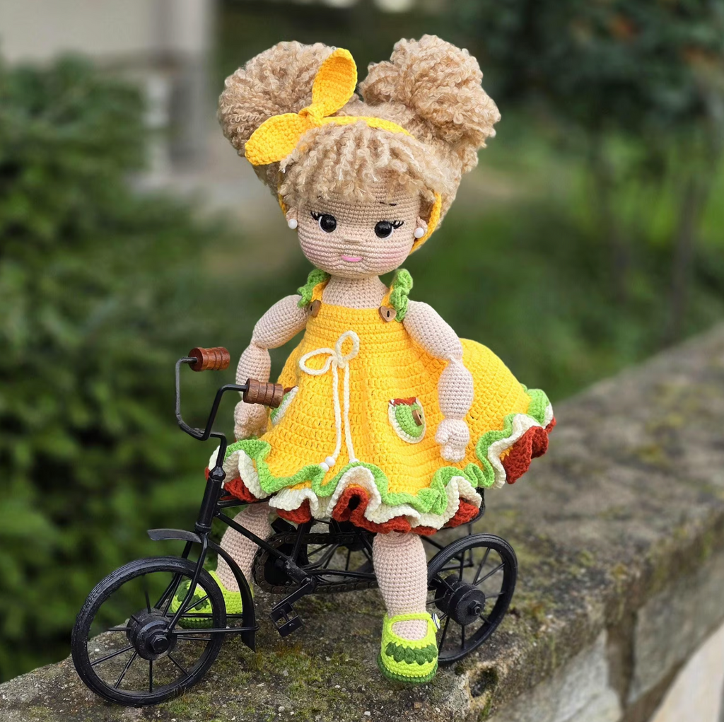 Amigurumi sunny girl doll crochet pattern – yellow dress and fluffy hair buns