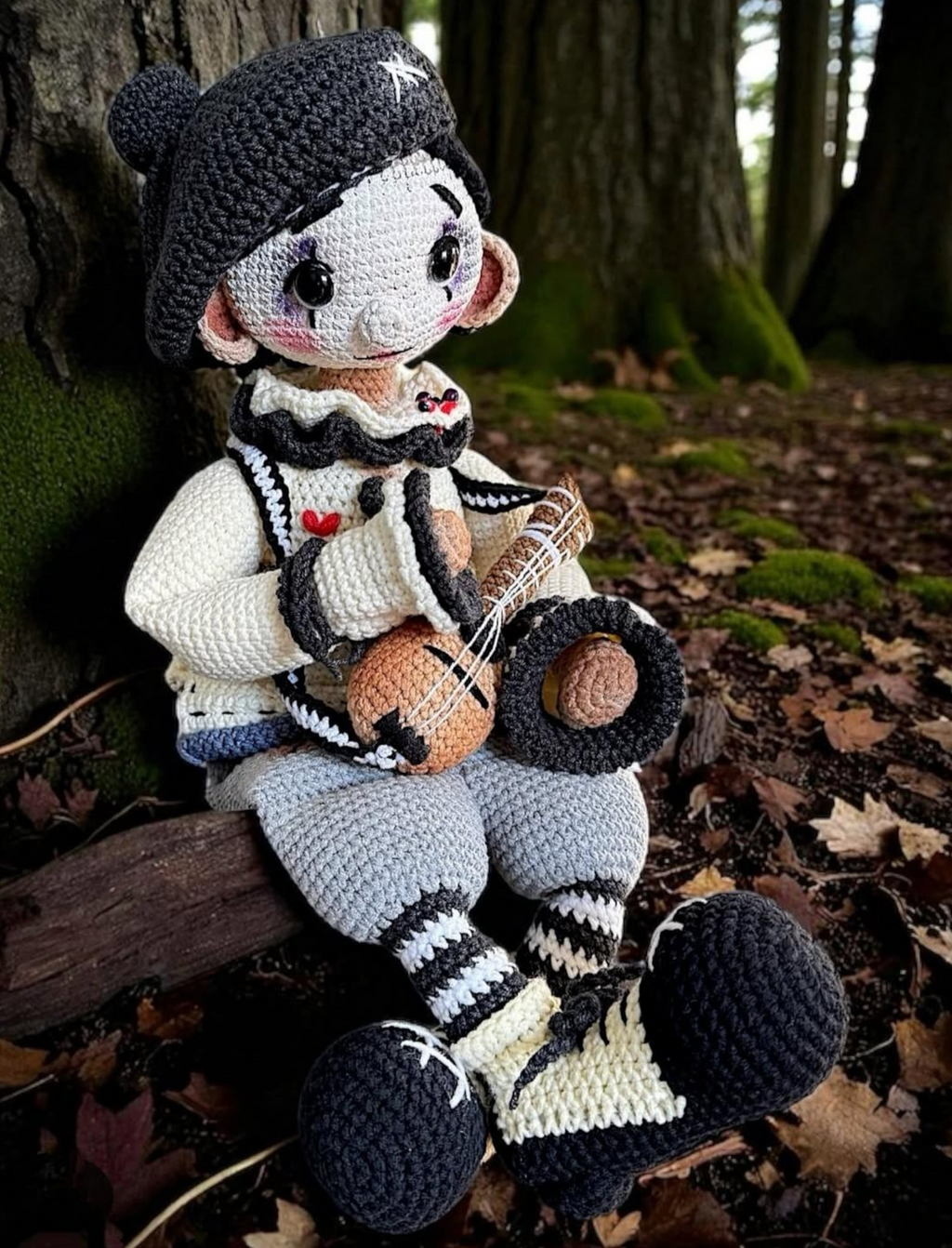 Amigurumi Pierrot clown doll crochet pattern – monochrome costume with guitar